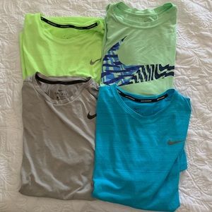 Bundle of four mens nike shirts. Dri fit. Large/XL. Great condition